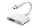 a close up of a usb to hdmi adapter on a white surface