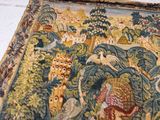 a picture of a tapestry with animals and birds on it