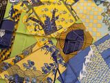 a table cloth with a pattern on it and a fan
