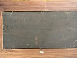 a picture of a chalk board in a wooden frame