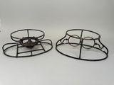 pair of vintage wrought iron trays with a bird on them