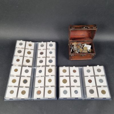 two boxes of coins and a wooden box with coins in them