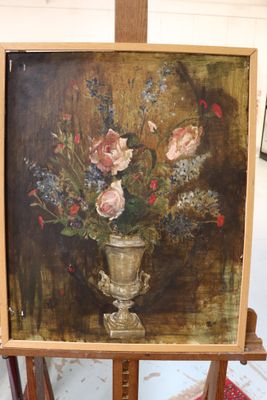 a painting of flowers in a vase on a easel