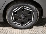 a close up of a tire on a car ' s rim