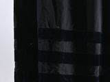 a black shawl with fringes on a mannequin mannequin mannequin mannequin mannequin mannequin mannequin manne