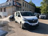 a white van parked in front of a building