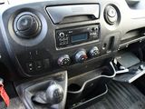 a dashboard of a car with buttons and controls on it