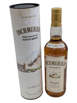 an image of a bottle of scotch whisky next to a cardboard box