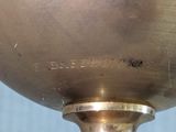 a close up of a metal object on a table