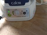 a close up of a blender on a wooden table