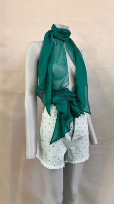 an image of a mannequin wearing a green scarf