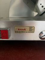 Une trancheuse à jambon APEMA. (photo 2)