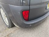 a car that is parked on the side of the street