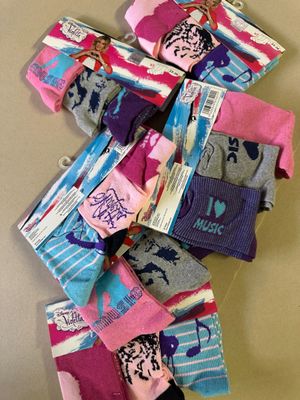 a pile of socks that are on a table
