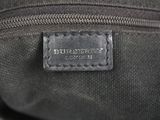 burbery black leather handbag with a leather label on the front