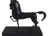 statue of a black horse on a black base on a white background