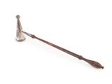 an old metal pipe with a wooden handle on a white background