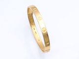 Bracelet « Love » rigide Cartier en or jaune 18 carats