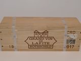 a wooden box with a label on it that says grand vin de laffite rothschied