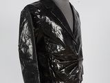 an image of a black jacket on a mannequin