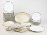 a lot of plates that are sitting on a table