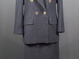 an image of a suit and skirt on a mannequin mannequin