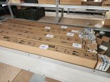 many boxes that are sitting on a shelf in a room