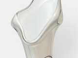 a white vase with a silver base on a white background