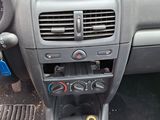 a dashboard of a car with a clock on it