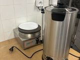 an image of a kitchen with a coffee pot and a scale