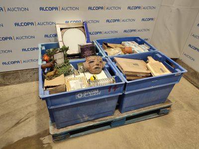 two blue bins filled with books and other items on a pallet