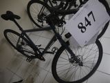 a bike with a price tag on it sitting on the floor