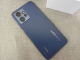 a close up of the back of a blue iphone 11