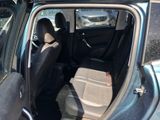 a car that is sitting in the back of the car