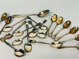 a lot of spoons and spoon spoons on the table