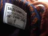 a label on a sweater that says sales sample not for frugable