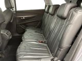 the back seats of a car are empty with no one in it