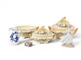 a lot of small figurines that are sitting on a table