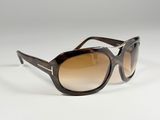 the sunglasses are made of plastic and have a brown lens