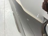 a close up of a person ' s hand on a car door handle