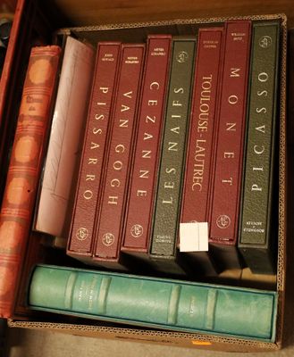 a box full of books sitting on a table