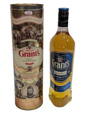 a bottle of grant ' s irish whiskey next to a canister