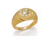 a yellow gold ring with diamonds on a white background