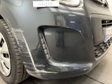 a close up of a car with a sticker on it ' s bumper