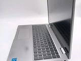 a laptop that is sitting on a white table
