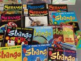 a lot of comic books that are on the table