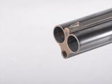 a close up of a gun on a white background