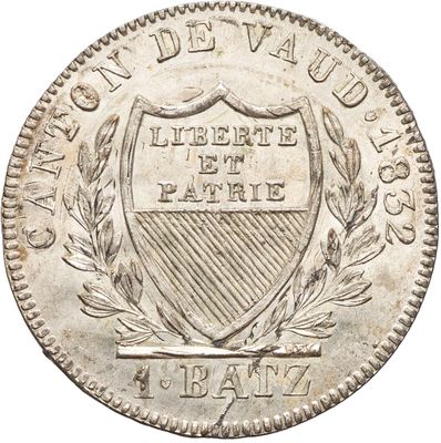 une pièce d'argent sur laquelle figurent un bouclier et un couronne de laurier