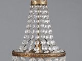 a close up of a chandelier hanging from a ceiling