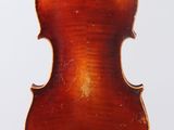an old violin with a wooden back and a long neck